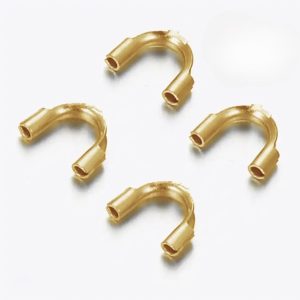 Terminales guardianes de acero inoxidable, ideales para bisutería artesanal y diseños personalizados" "Detalle de terminales guardianes en acero inoxidable, perfectos para collares y pulseras de bisutería" "Par de terminales guardianes de acero, diseñados para un acabado seguro y elegante en bisutería" "Terminales guardianes en acero inoxidable, funcionales y elegantes para crear piezas únicas de joyería" "Terminales guardianes de acero inoxidable con acabado duradero, perfectos para diseñadores de bisutería"